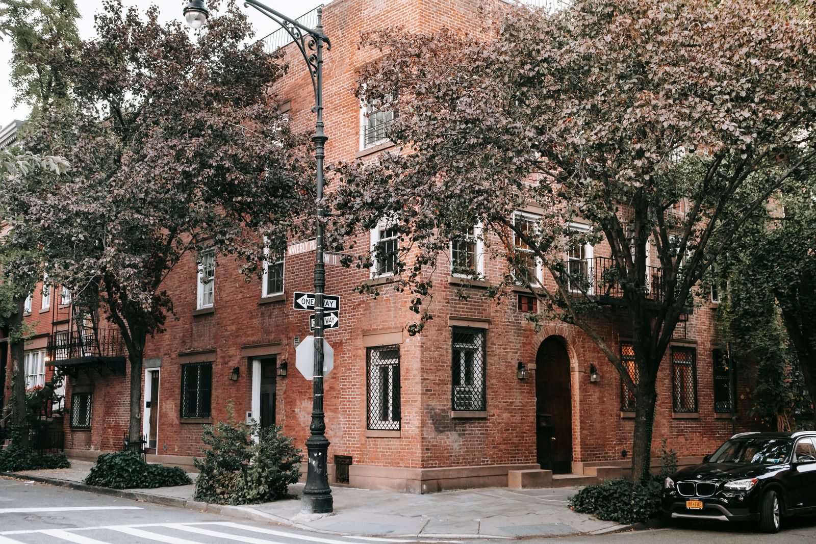 Brick home on a tree-lined street in Highland Park